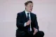 Elon Musk speaking at an event