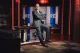Rich Eisen posing on the set of his talk show