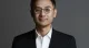 Pony Ma Called Tencent's AI Push 'A Leaky Ship.' His Cloud Chief Found an Unlikely Fix. 2 Portrait of Tencent Cloud chief Dowson Tong in a dark suit