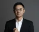 Portrait of Tencent Cloud chief Dowson Tong in a dark suit